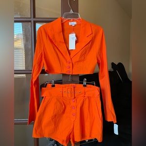 cute orange collard button up with matching shorts never worn !!